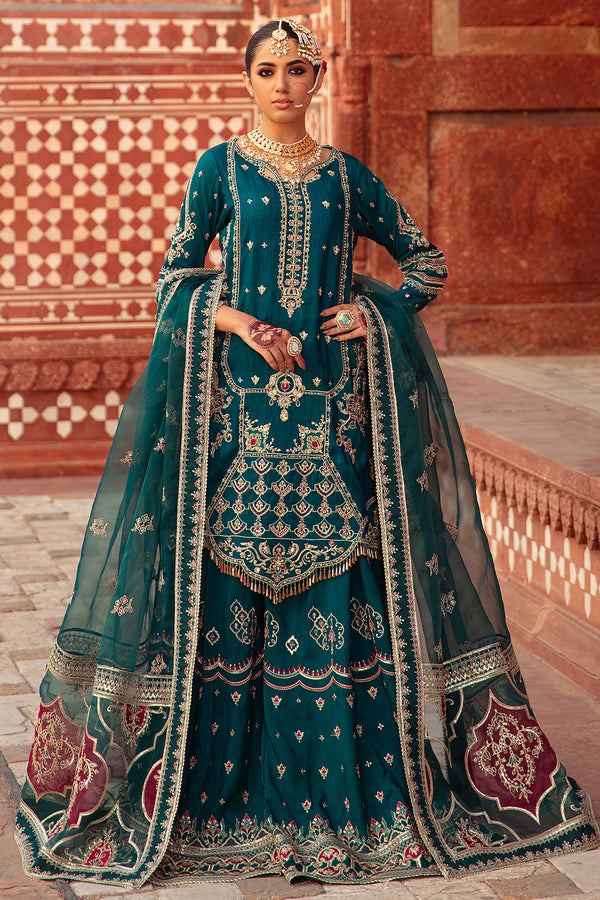 Naqshi Zamurd zinc-grey organza shirt with detailed front embroidery and adda work, paired with Indian raw‑silk sharara and ornate organza dupatta.