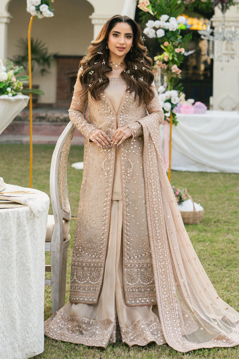 Ezaraa peach pink tissue lehenga gown with mirror work, shown from the front with net dupatta, formal wedding outfit by NAQSHI
