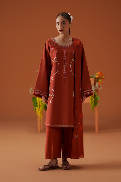 Ophelia rust 3-piece ready-to-wear outfit with embroidered lawn shirt, cambric culotte trouser, and printed crinkle chiffon dupatta.