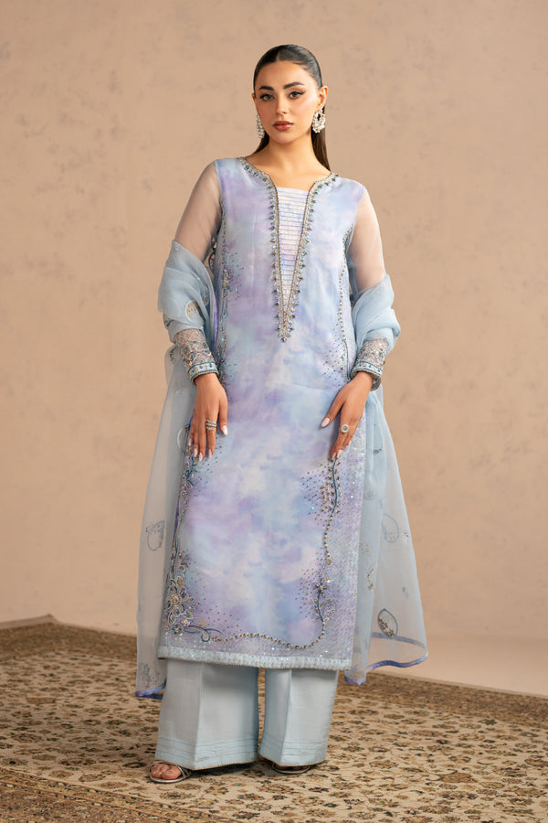 Rozal sky blue 3 piece semi formal suit by NAQSHI, front view long organza shirt with digital inner, culotte trousers and light organza dupatta, ready to wear occasion outfit.