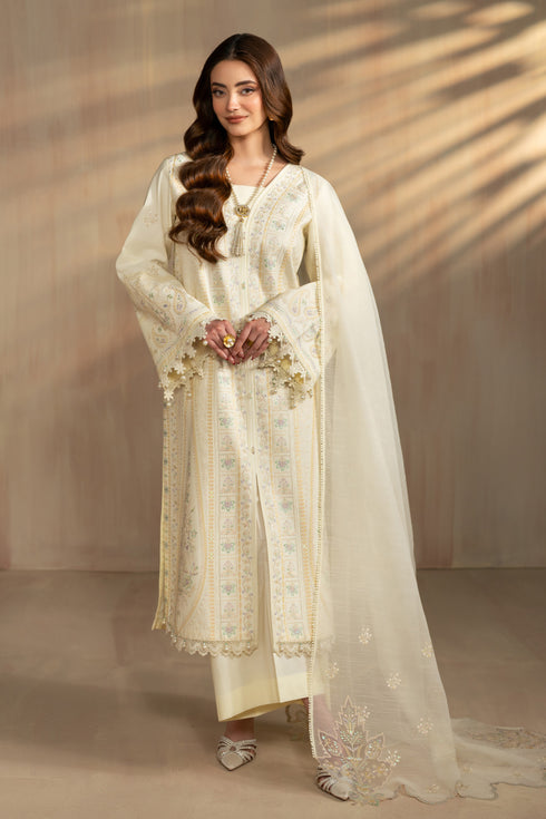 Ashnoor off white 3 piece embroidered lawn suit by NAQSHI, full front view long straight shirt with vertical white thread embroidery, cambric flared trousers and cotton organza dupatta, ready to wear summer outfit.