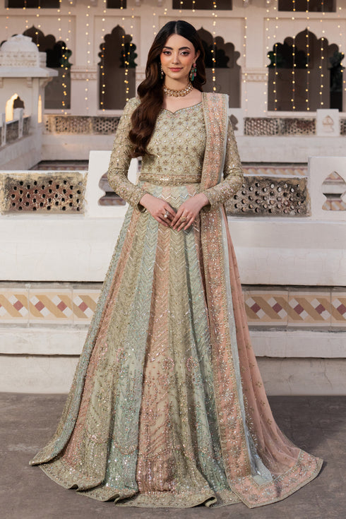 Woman in a traditional outfit standing in front of an architectural background