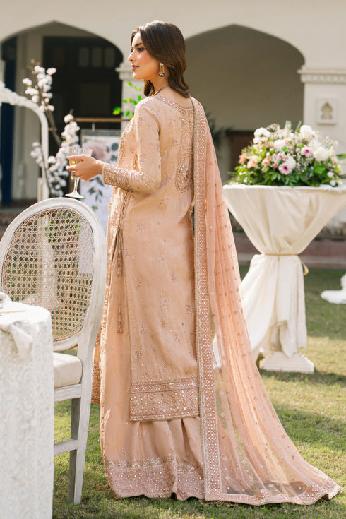 Back view of Talisa peach raw silk shirt with sharara and net dupatta, traditional formal outfit for special occasions