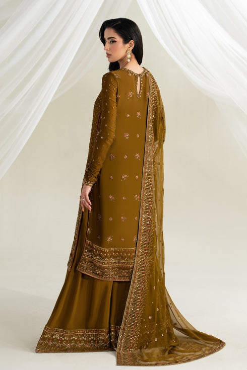 Deep brown georgette long shirt side view with flared trousers and crinkle dupatta, soft flowy formal outfit for special occasions