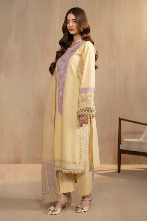 Side view of Nijah outfit showing modest straight shirt fall and embroidered sleeve borders, lightweight summer ready made eastern wear.