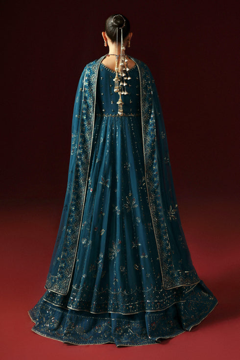 Side profile of NAQSHI Marina in zinc showing full panel flare, adda embroidery and sequined sleeve edge