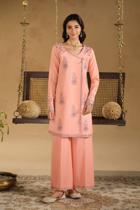 Full length view of Umaiza pink festive dress showing relaxed straight shirt silhouette and wide culotte trousers