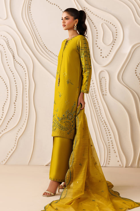 Side angle of NAQSHI Evara outfit highlighting 3-panel cambric shirt, side cutwork detail, and balanced silhouette