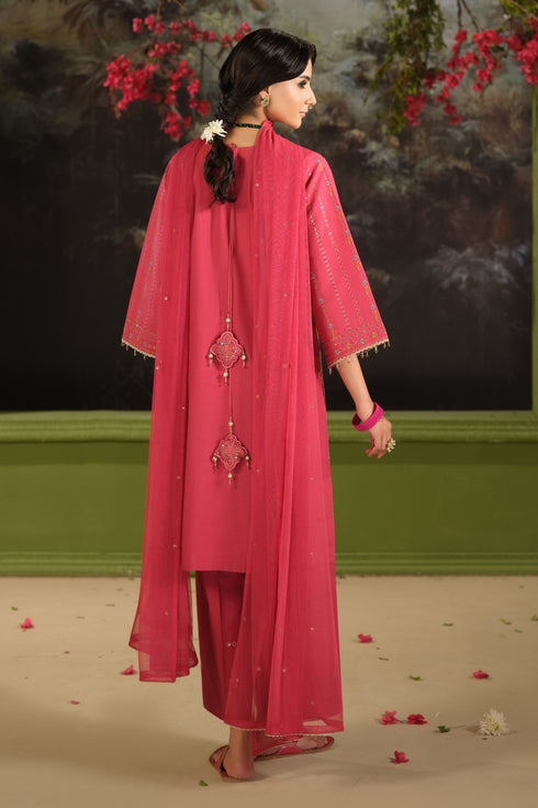 Back view of NAQSHI Kinara carrot pink Pima lawn shirt with cambric culotte trousers and flowing net dupatta