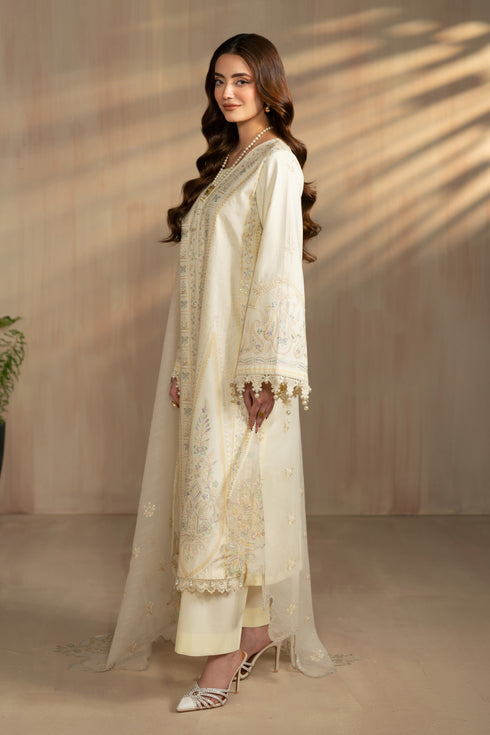 Side view of Ashnoor outfit showing modest straight silhouette and soft organza dupatta fall, stitched summer eastern wear.