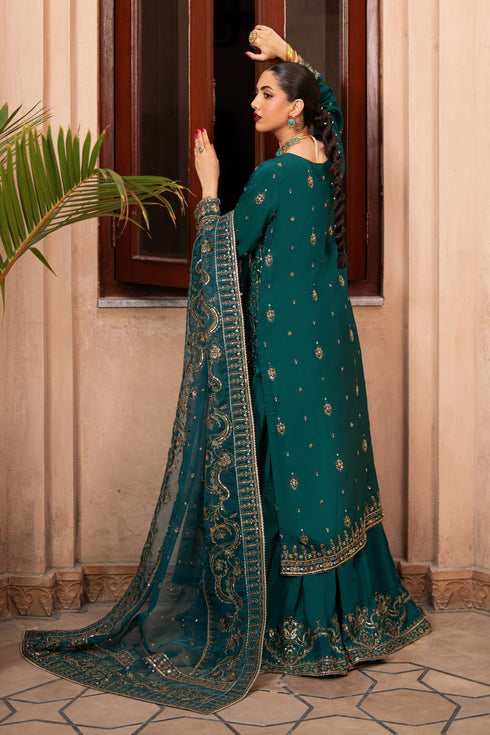 NAQSHI Gul-e-Rimal side pose showcasing flowy dupatta, pintuck details, and embroidered shirt.