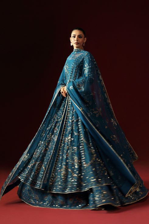 Side profile of NAQSHI Marina in zinc showing full panel flare, adda embroidery and sequined sleeve edge