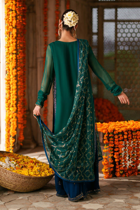 Back view of Anfa green and blue semi formal suit with net dupatta, long shirt silhouette and elegant Eastern wear styling