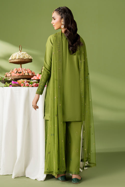 Back standing view of NAQSHI Sana outfit highlighting clean three-panel shirt cut and relaxed culotte trousers