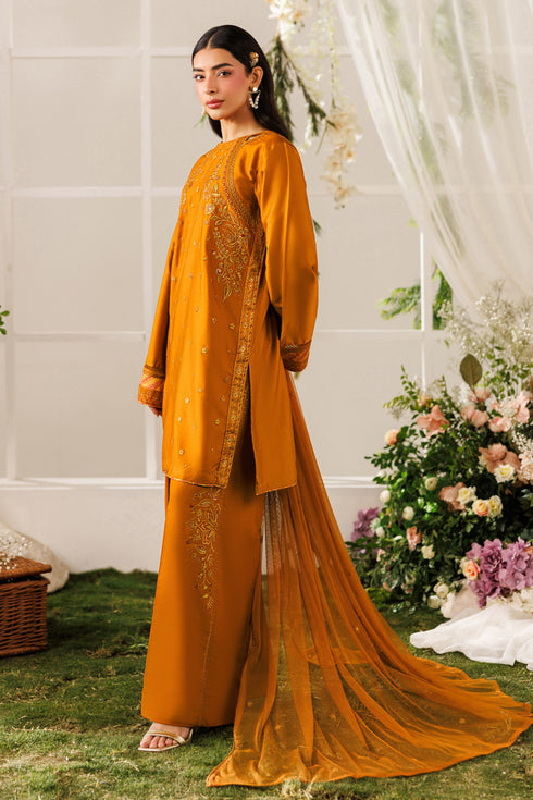 Side view of NAQSHI Mohib outfit showing flowing net dupatta with embroidered borders and scalloped edging