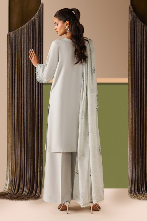 Back view of NAQSHI Piper outfit showing straight cambric shirt fall, loose sleeves, and light organza dupatta