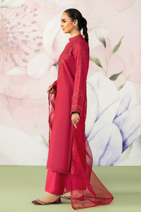 Woman in a red traditional outfit with floral background