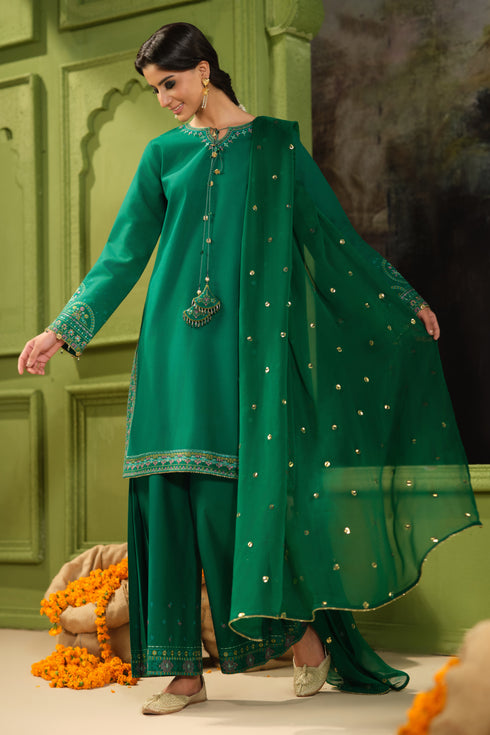Side view of NAQSHI Malika green three piece outfit showing embroidered shirt panels, culotte trousers, and sequin crinkle dupatta
