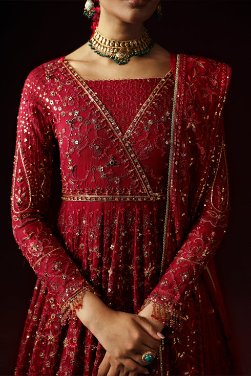 Close-up of NAQSHI Zilly’s red adda embroidery and sequin floral embellishments on crinkle chiffon panel