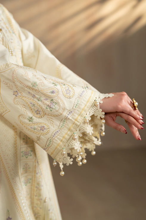 Sleeve close up of Ashnoor showing embroidered borders and bead finishing on cuff, detailed summer ready to wear suit.
