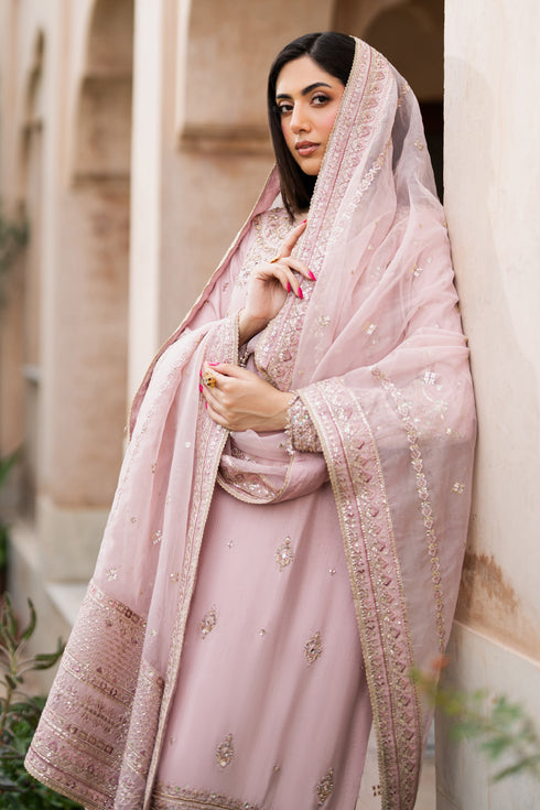 NAQSHI Gul-e-Meena angled view – full-length embroidery, sequins, and hem border in lavender ensemble