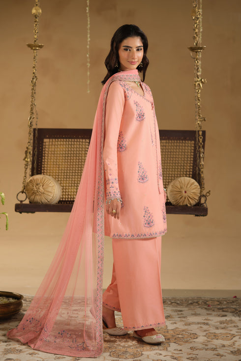 Side angle of Umaiza ready to wear outfit with flowing net dupatta and embroidered sleeve borders