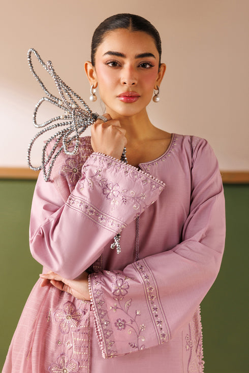 Front close-up of NAQSHI Alvin outfit showing sleeve embroidery, organza appliqué details, and soft lilac tone