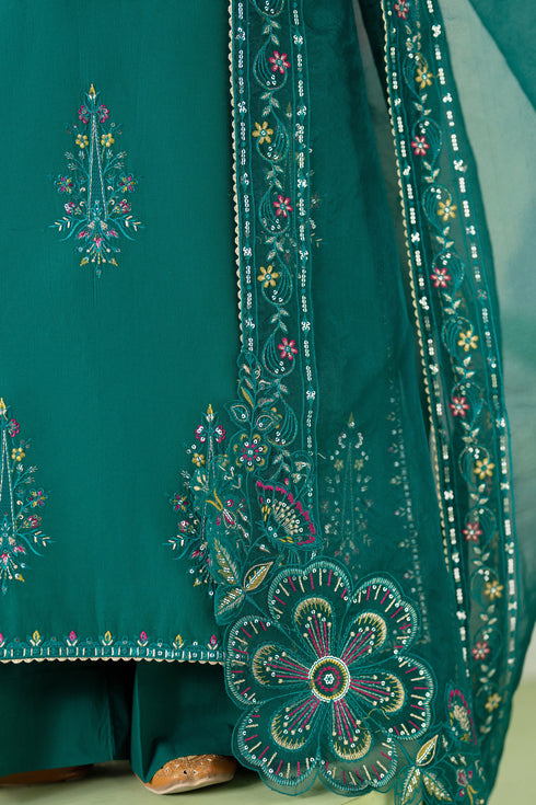 Model wearing NAQSHI Ankita 3-piece olive green ensemble with pearl neckline shirt, cambric trousers and net dupatta