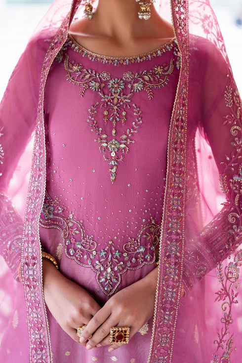 Close view of Shams lilac organza shirt with boat neckline embroidery, sequins and adda work