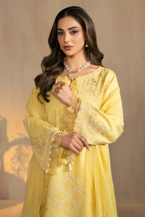 Portrait styling view showing embroidered neckline and sleeve detailing of Sheiza yellow 3 piece ready to wear outfit.