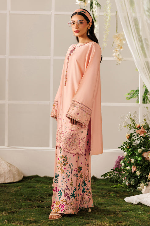 Side standing view of NAQSHI Hoorish outfit highlighting printed culottes and smooth cotton satin fabric