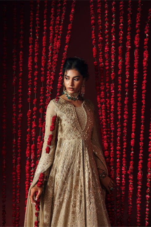 Model wearing NAQSHI Saleha 3-piece skin ensemble: sequined maxi, raw silk trousers & lace edged dupatta