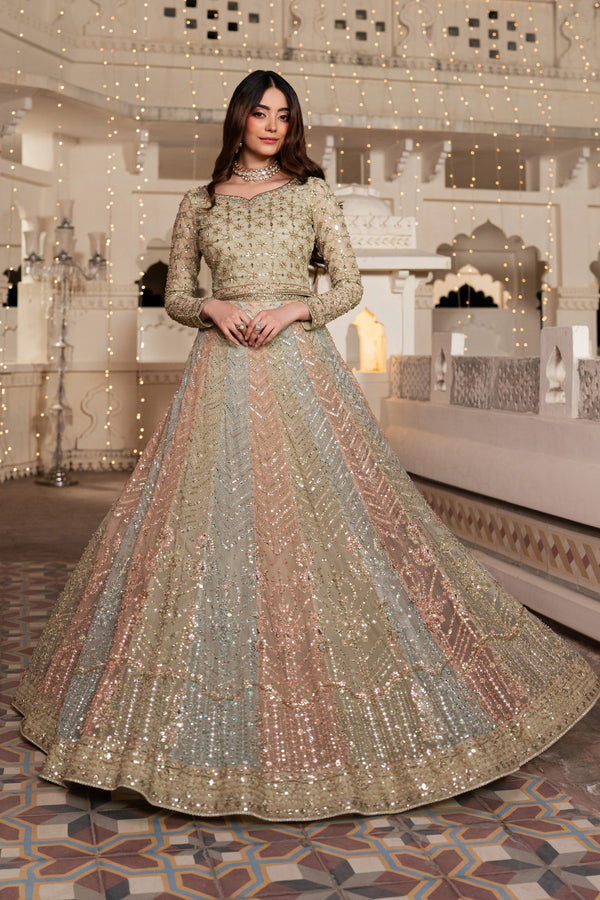 Woman in a traditional embroidered outfit standing in an ornate indoor setting.