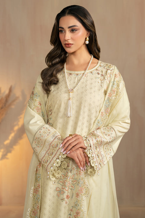 Portrait styling view showing front embroidery placement and balanced silhouette of Nerissa light olive 3 piece ready to wear suit.