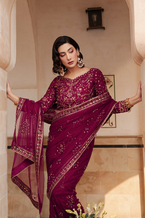 Detailed shot of NAQSHI Meeru net saree pallu displaying glistening floral motifs with crystals, sequin, thread embroidery and minimal lace border