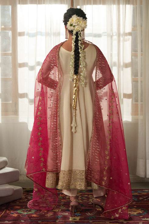 Back view of NAQSHI Rumi frock offering clean straight cutline in viscose Masoori with subtle adda embroidery at nape