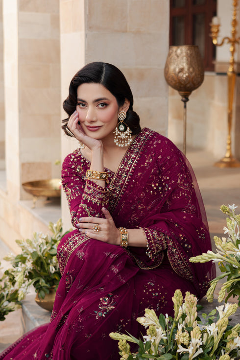 NAQSHI Meeru close‑up of raw silk blouse decorated with hand adda work, sitara, kora, dabka, crystals & thread embroidery around boat neckline