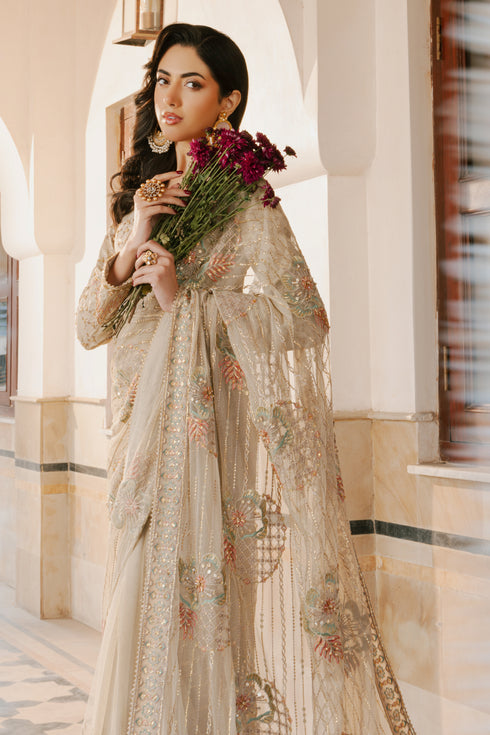 Close‑up of NAQSHI Ramish saree border with line embroidery, subtle sequin play and finely finished minimal lace edge