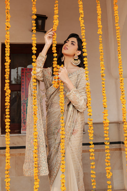 Close‑up of NAQSHI Ramish saree border with line embroidery, subtle sequin play and finely finished minimal lace edge