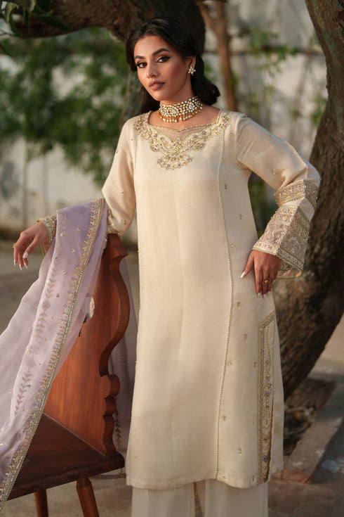 NAQSHI Kai front shot: raw silk culottes with pleated detail and luxurious texture