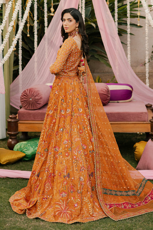 Rear view of NAQSHI Romanvi choli showcasing heavy handmade tassels on back, sequin-adorned sleeves and boat-neck with hand-adda work