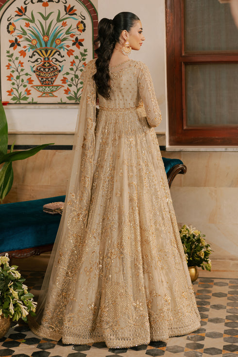 Back of NAQSHI Maneha frock featuring statement keyhole opening, hand‑embellished spray, and pearl‑stone work along seam lines