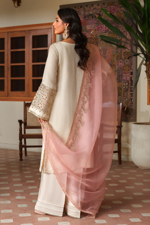 Back view of NAQSHI Annie shirt revealing straight cutline and embroidery cascading down