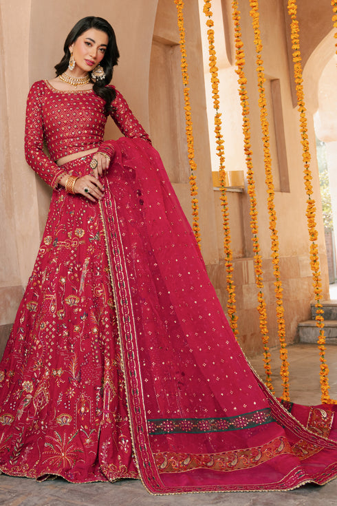 NAQSHI Nageen hot‑pink raw‑silk lehenga choli with boat neckline, heavy sequin embroidery on front bodice, lush floral motifs on lehenga and matching embellished organza dupatta