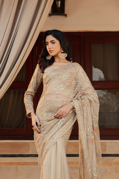 Close‑up of NAQSHI Ramish blouse boat neckline adorned with hand‑embroidered kora, dabka, sitara, stones, crystals and threadwork