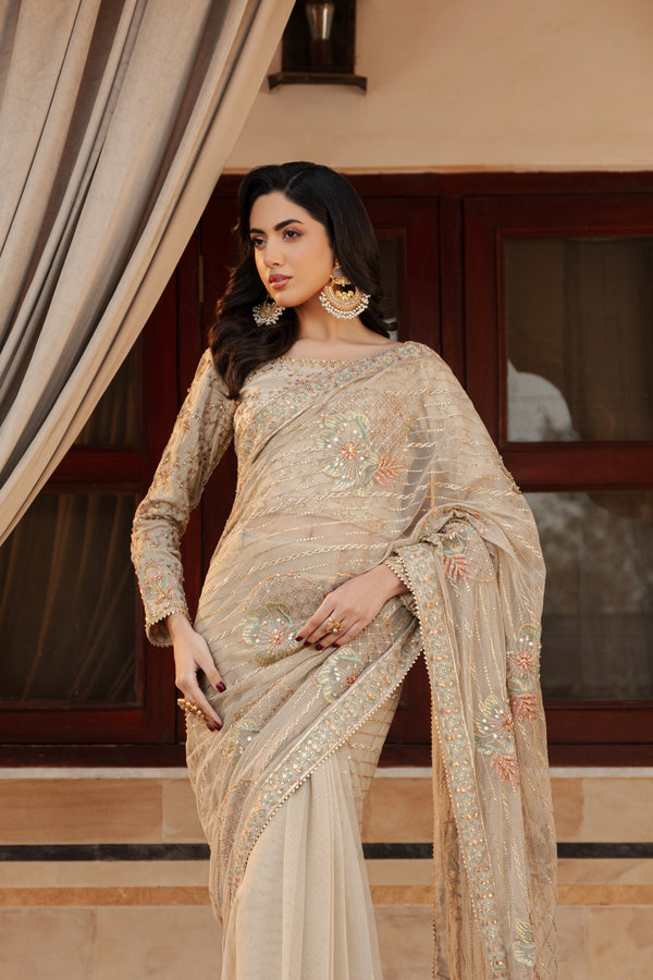 Close‑up of NAQSHI Ramish blouse boat neckline adorned with hand‑embroidered kora, dabka, sitara, stones, crystals and threadwork