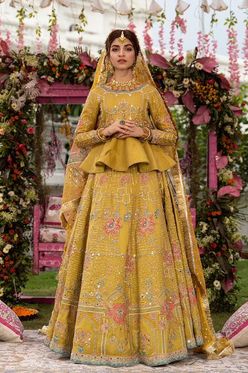 Naqshi Gulnaar light‑parrot green raw‑silk peplum with heavy floral mirror and adda embroidery, Victorian arch jaal, paired with flared lehenga, tasselled pouch & mirror‑inlaid khussa
