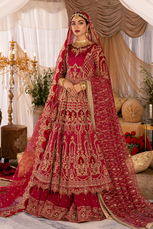 Naqshi Geeti Aara fuchsia‑red raw‑silk front‑open frock with dense tilla and sequin embellishments, paired with ruffled raw‑silk lehenga, velvet‑patched organza dupatta.