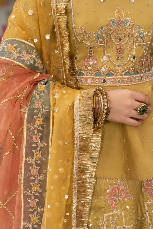 Model elegantly styled in full Naqshi Gulnaar 5PC set: peplum, lehenga, pouch, khussa & more, for wedding or festive glamour