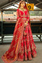 Naqshi Mastani carmine-red raw-silk lehenga choli showcasing all-over Mughal-inspired adda embroidery, cutwork borders, hanging tassels, styled with net and organza dupattas plus structured clutch.